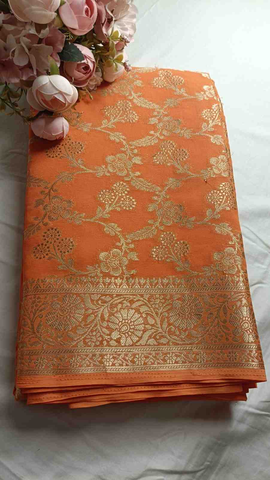 ORANGE TRIFLORAL JAAL BANARASI KHADDI GEORGETTE SAREE