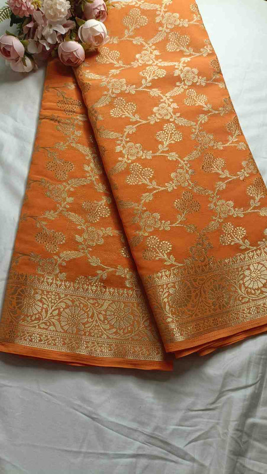 ORANGE TRIFLORAL JAAL BANARASI KHADDI GEORGETTE SAREE