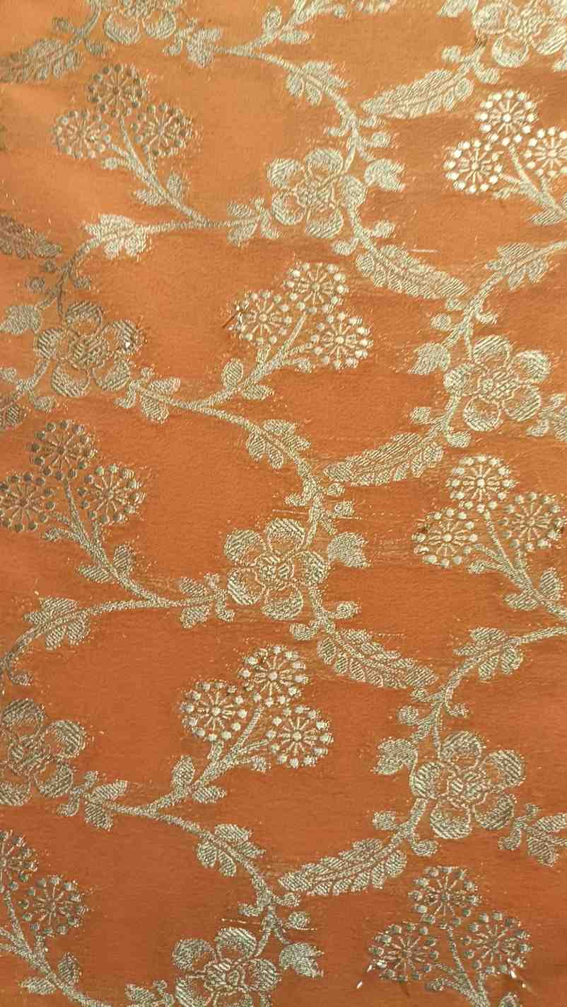ORANGE TRIFLORAL JAAL BANARASI KHADDI GEORGETTE SAREE
