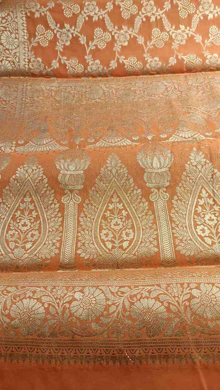 ORANGE TRIFLORAL JAAL BANARASI KHADDI GEORGETTE SAREE
