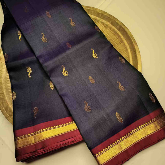 Traditional Saada Vanki Butta motifs with Kasam Butta fillers on navy silk