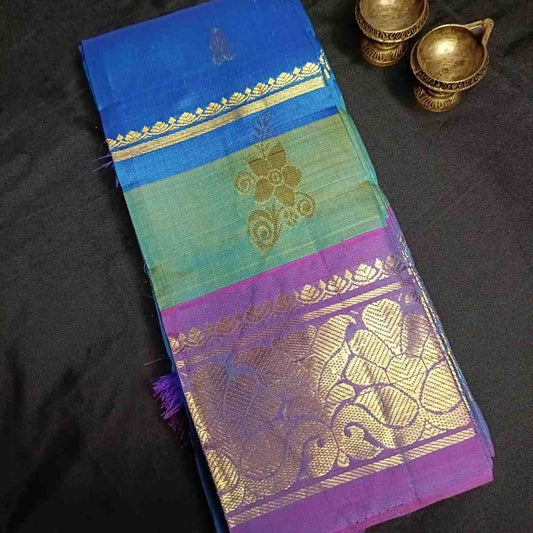 Pure handloom Thirubhuvanam silk saree in dual tone peacock blue with violet poo zari border, antique zari manga and floral motifs, 5.28m no blouse