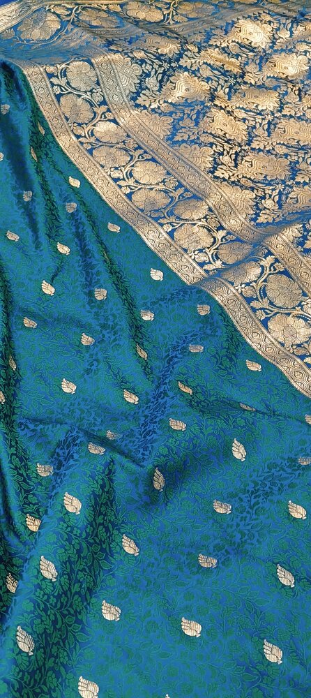 PEACOCK BLUE FLORAL TANCHUI BUTI BANARASI KATAN SILK SAREE