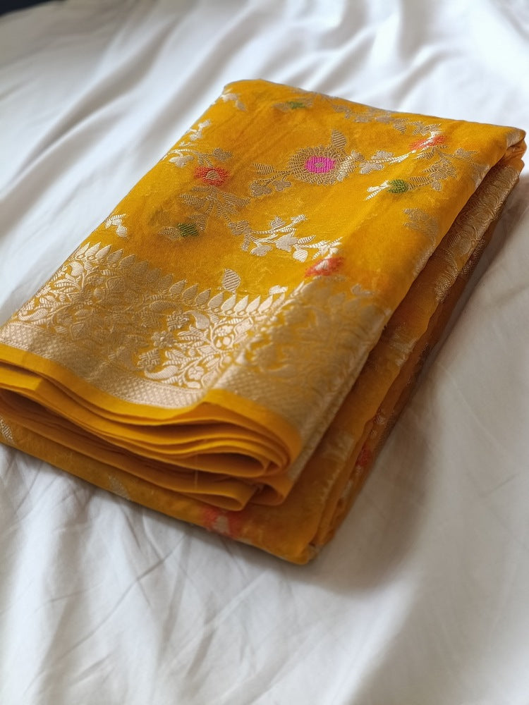 YELLOW MEENAKARI FLORAL JAAL KHADDI GEORGETTE BANARASI SAREE