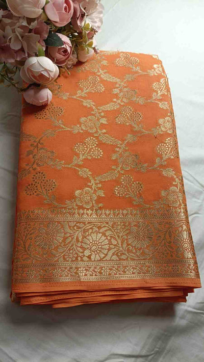 ORANGE TRIFLORAL JAAL BANARASI KHADDI GEORGETTE SAREE
