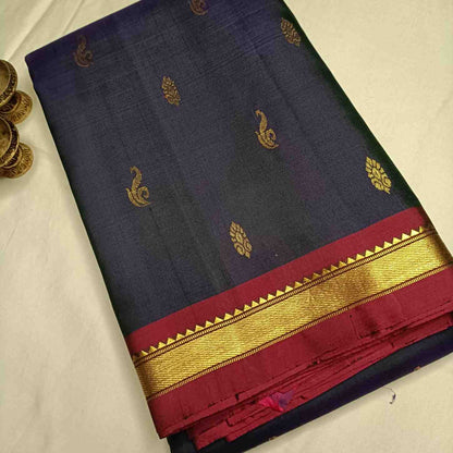 Pure mulberry silk Kanjivaram fabric showing deep navy blue tonal weave