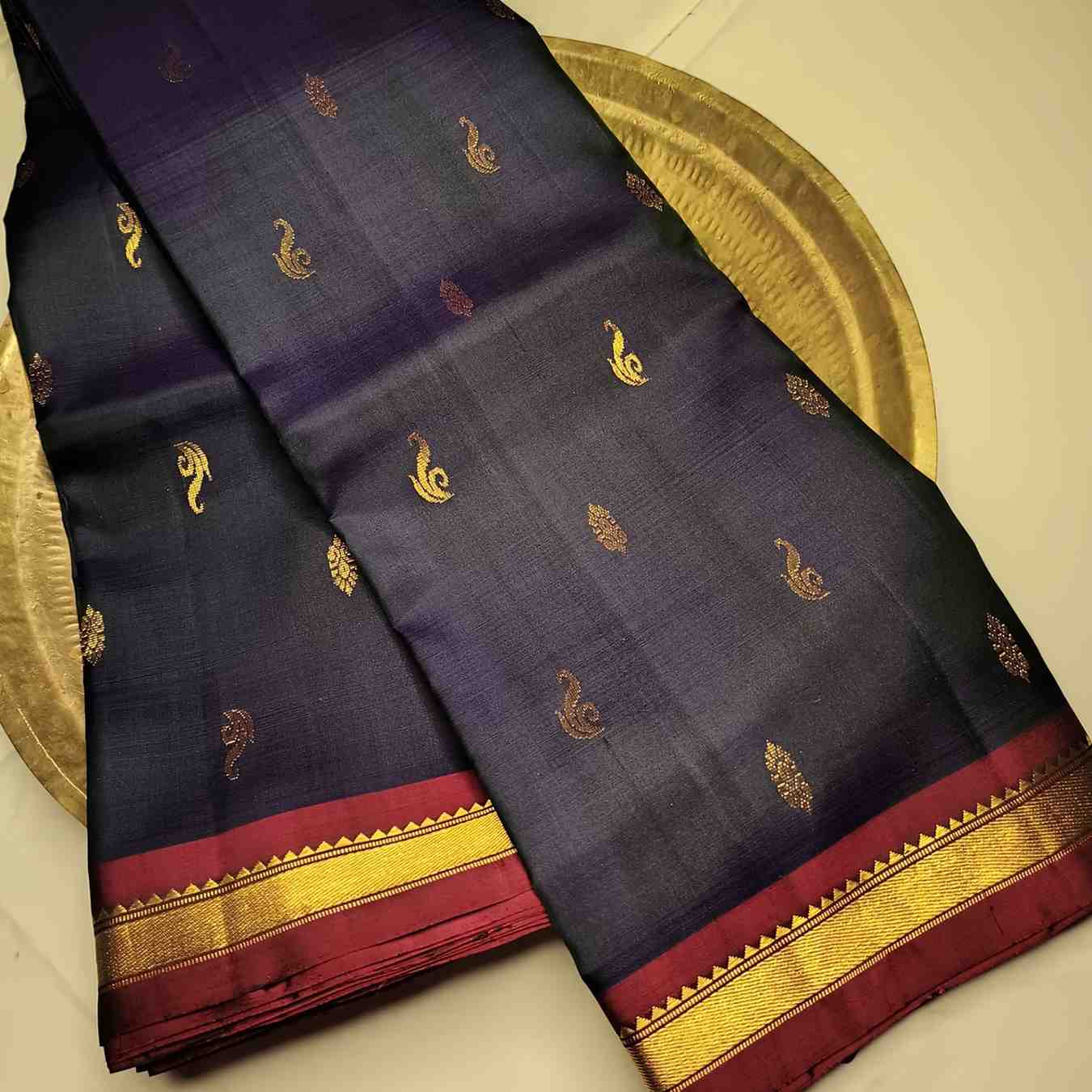 Traditional Saada Vanki Butta motifs with Kasam Butta fillers on navy silk