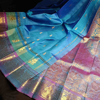 Thirubhuvanam silk saree pallu in dual tone peacock blue with intricate antique zari motifs and fine parallel zari lines
