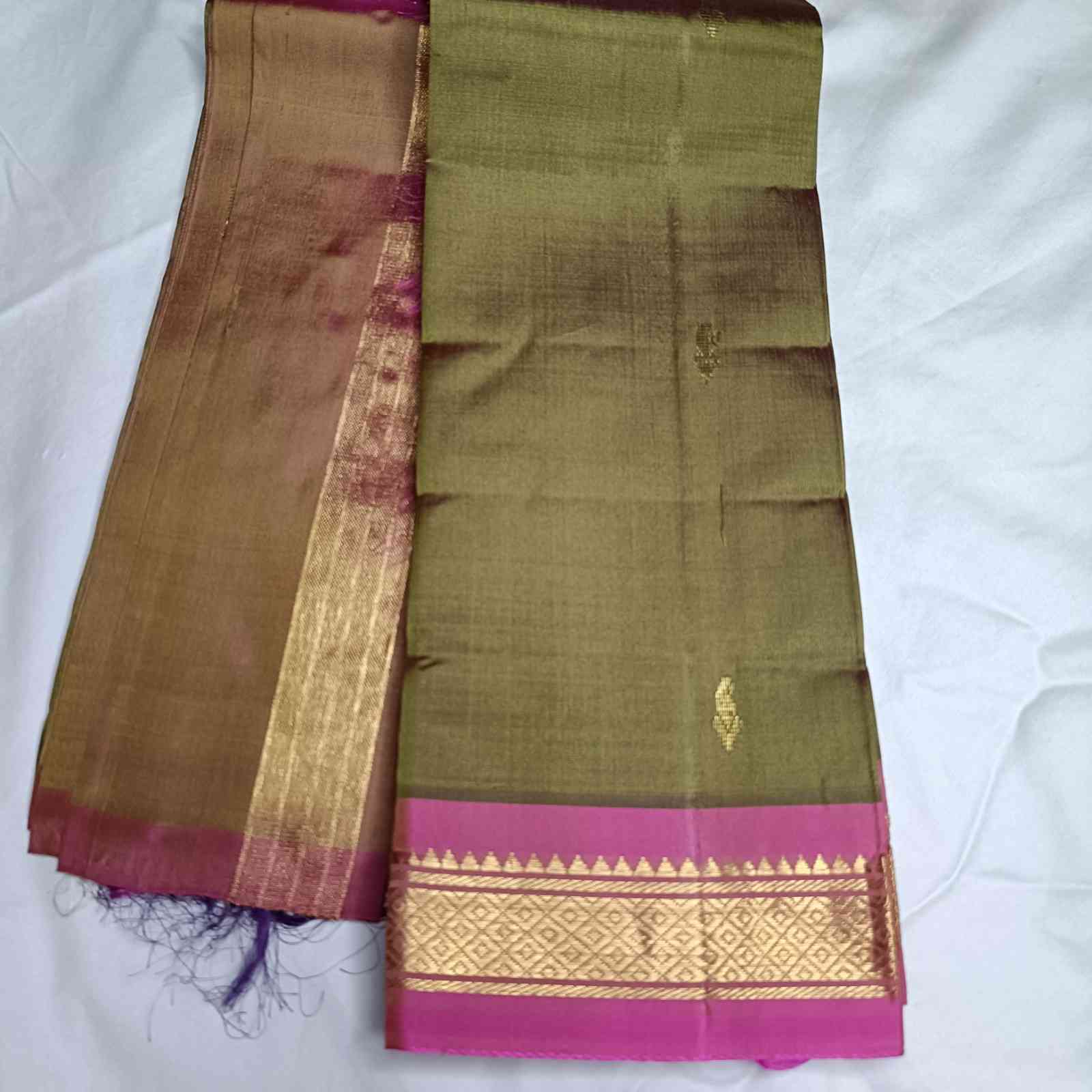 Olive Green Thirubhuvanam silk saree plain body showing minimalist elegance