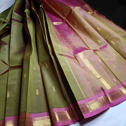 Olive Green Thirubhuvanam saree with pink contrast border detail