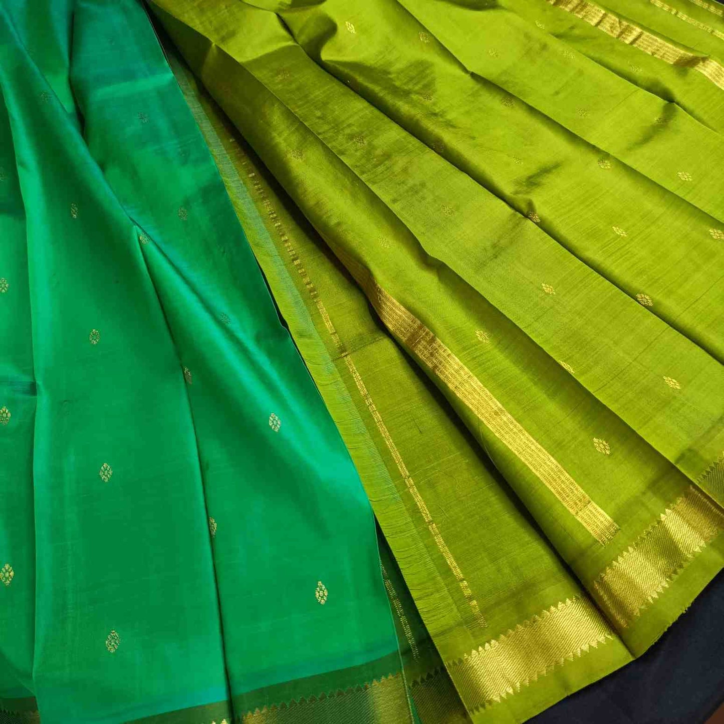 Green and yellow saree with a patterned border