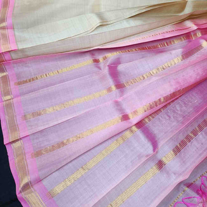 Lotus pink pallu with thin zari lines on ivory Thirubhuvanam silk saree