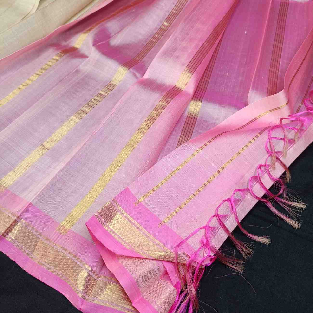 Lotus pink pallu with thin zari lines on ivory Thirubhuvanam silk saree