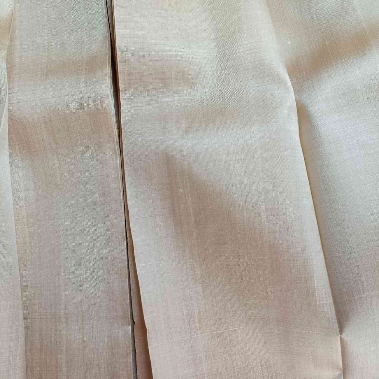 Pure handloom Thirubhuvanam silk fabric showing lightweight 1.5 warp weave