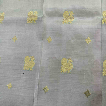 Pure handloom Thirubhuvanam silk fabric texture showing 650g premium weave quality
