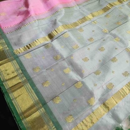 Pink Thirubhuvanam silk saree pallu with golden zari work and Annapakshi design
