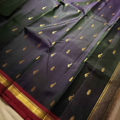 Pure mulberry silk Kanjivaram fabric showing deep navy blue tonal weave