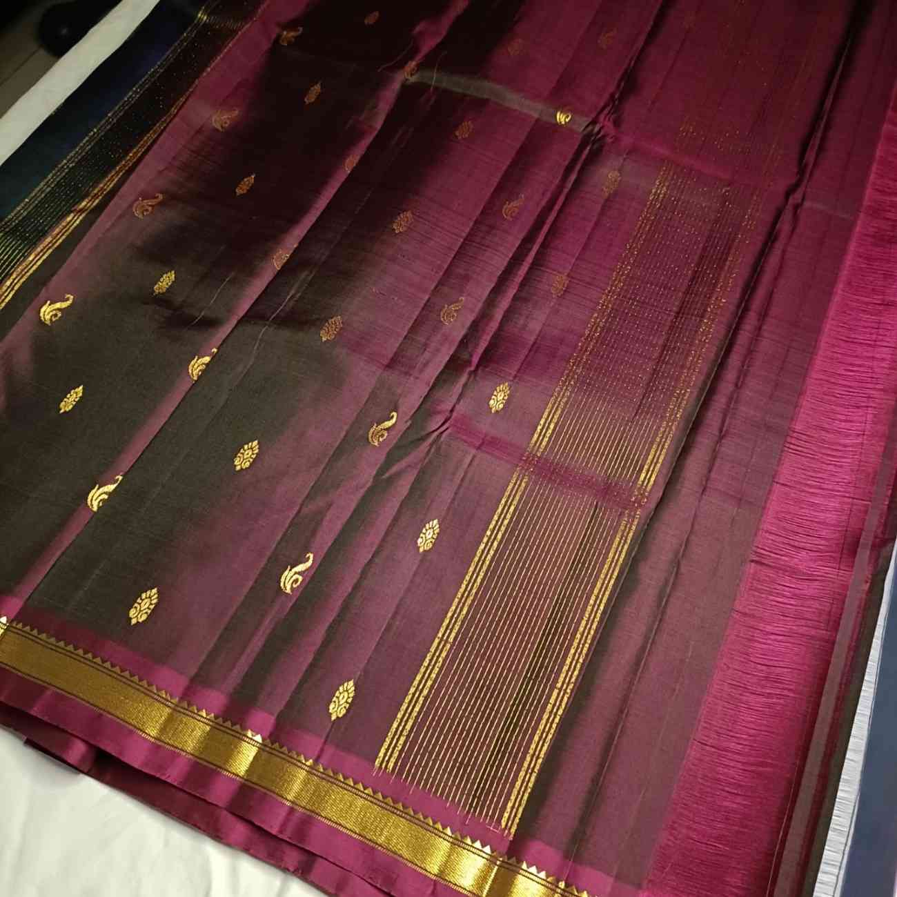Navy blue Kanjivaram silk saree pallu in Arakku-Paaku wine with zari lines